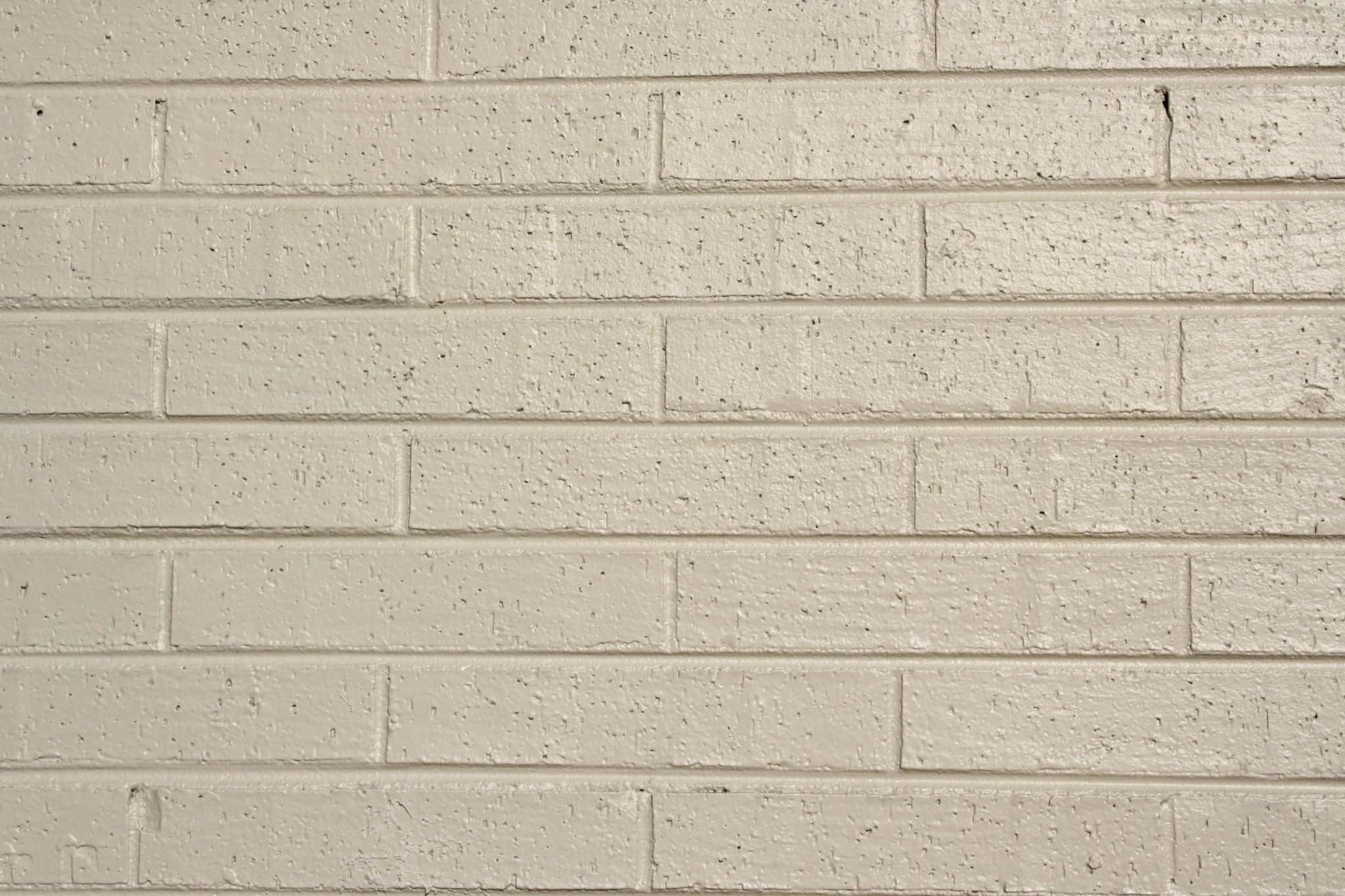 Crema farve baggrund mursten mønster