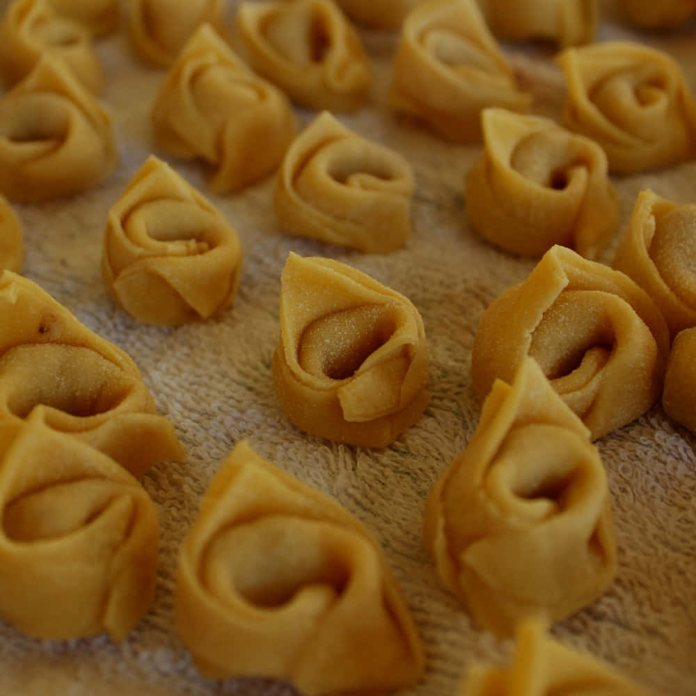 Creating Tortellini For Tortellini In Brodo Wallpaper