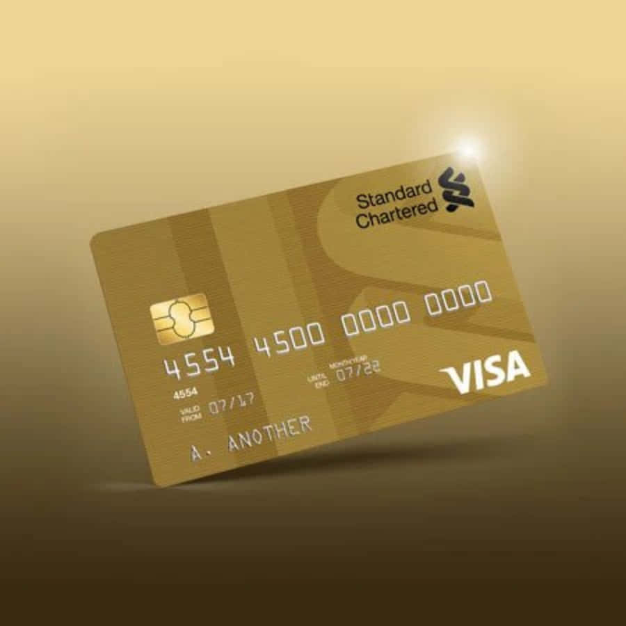 A Gold Credit Card With The Word 'bank Of America'
