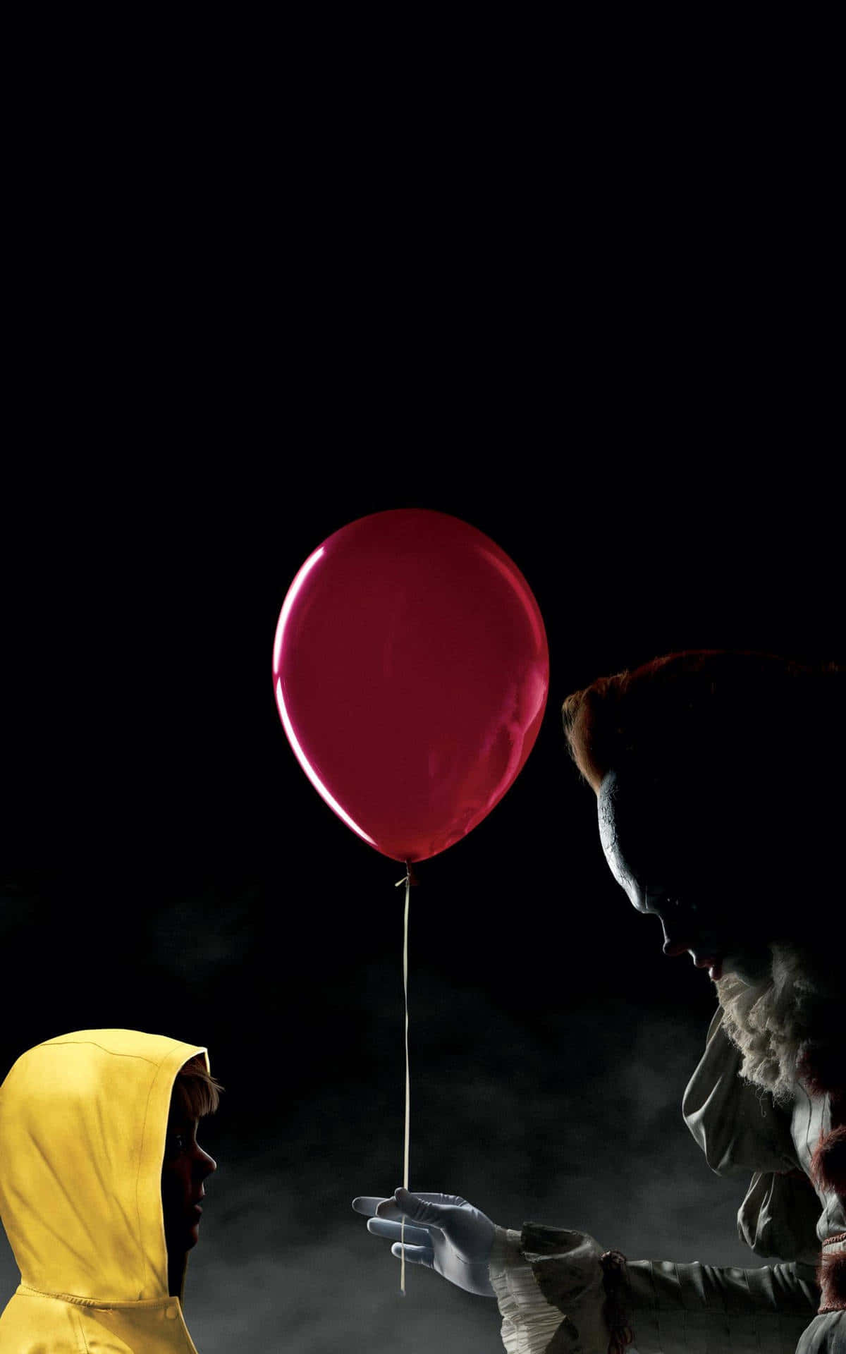 Creepy_ Clown_and_ Child_with_ Red_ Balloon Wallpaper