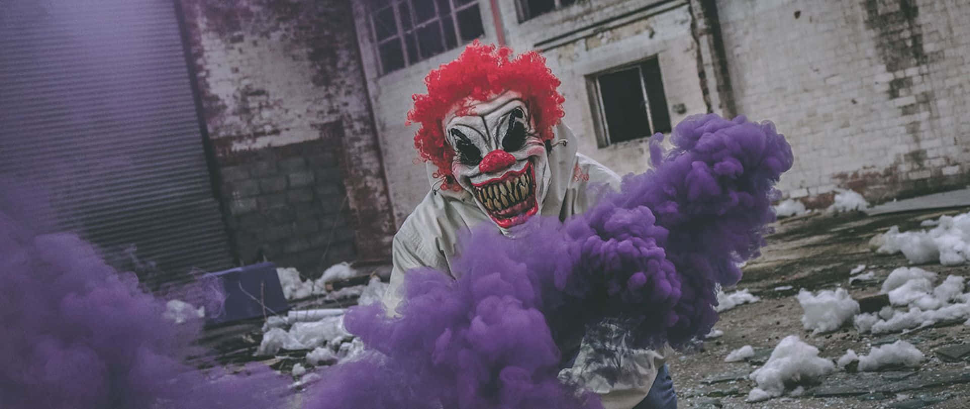 A Clown With Purple Smoke In His Hands