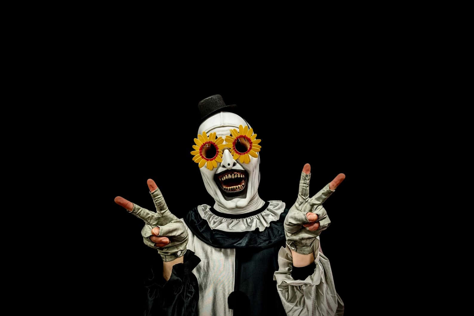 Creepy Clown With Sunflower Eyeglasses Wallpaper