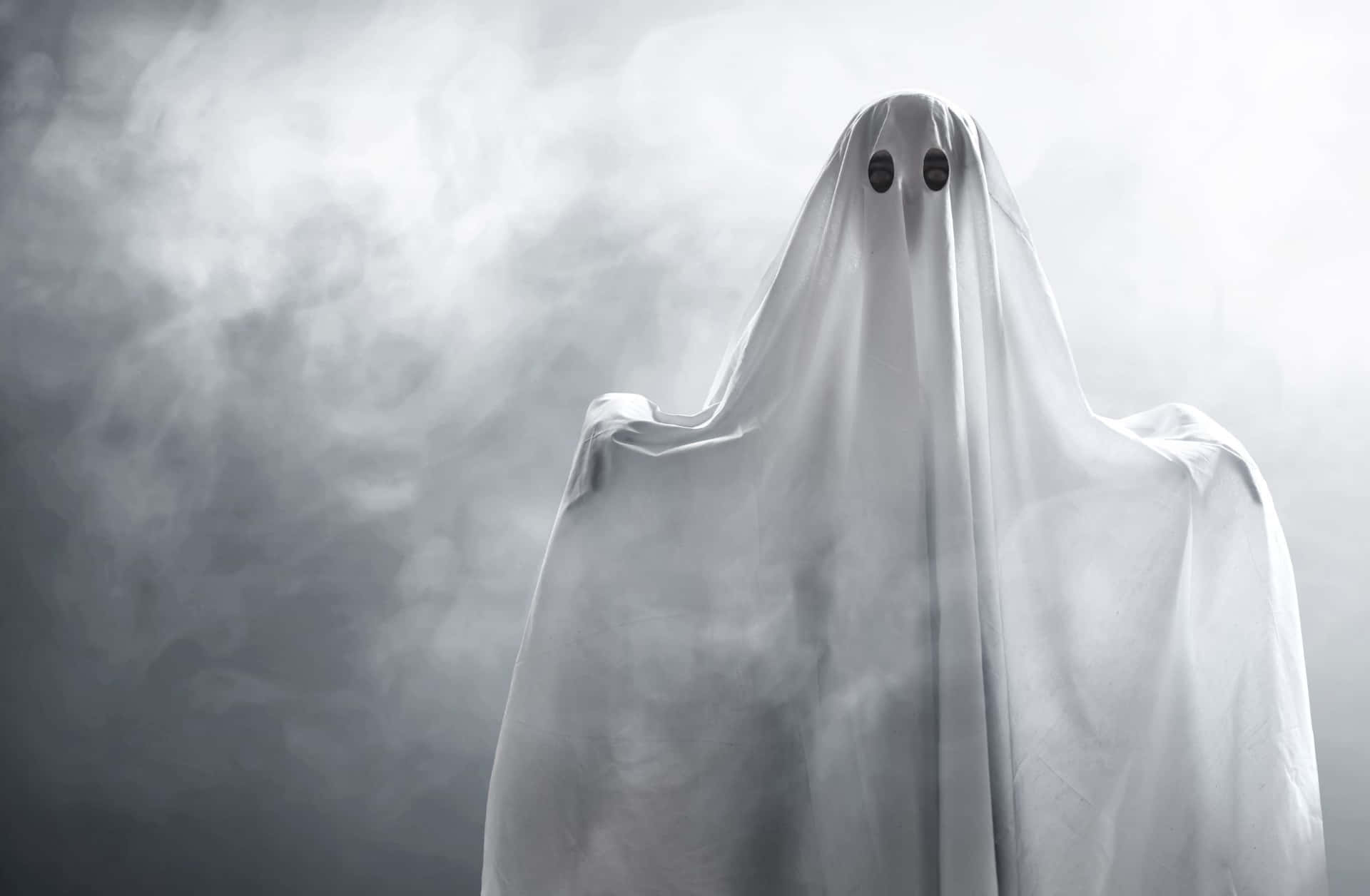 A Ghost In A White Costume Is Standing In The Air