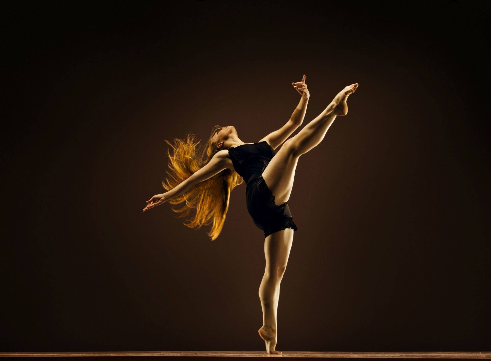 Graceful Performance by a Professional Ballet Dancer Wallpaper