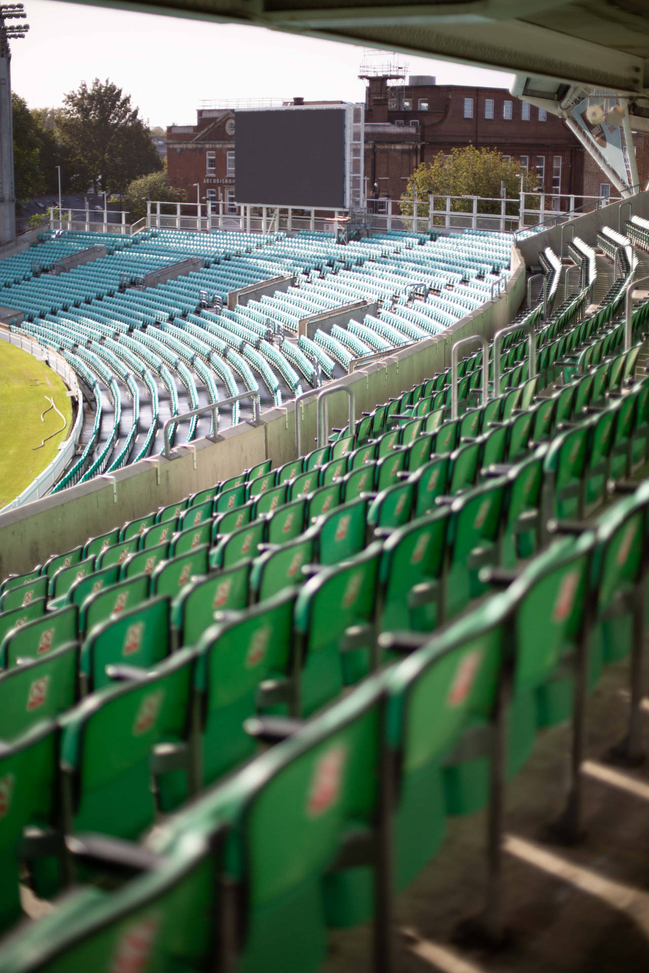 Cricket Stadium Coloured Chairs Wallpaper
