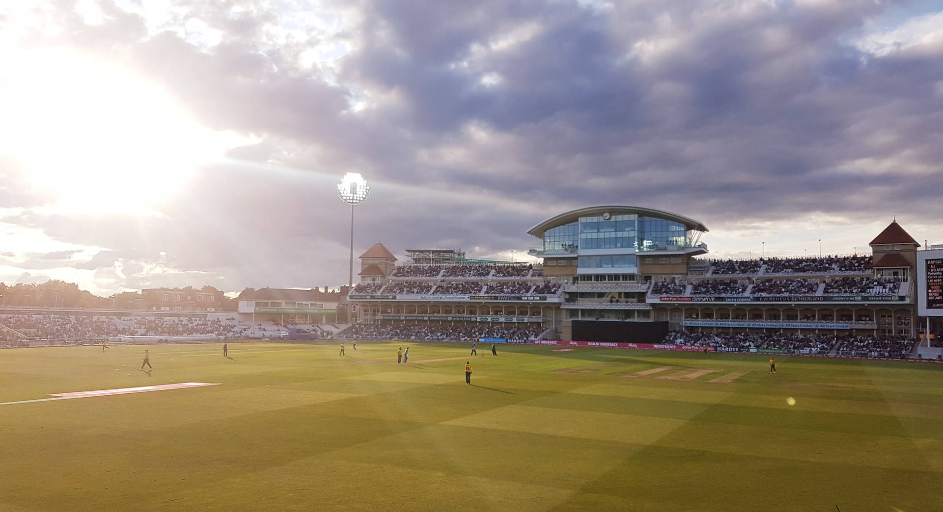 Cricket Stadium Under Sunlight Wallpaper