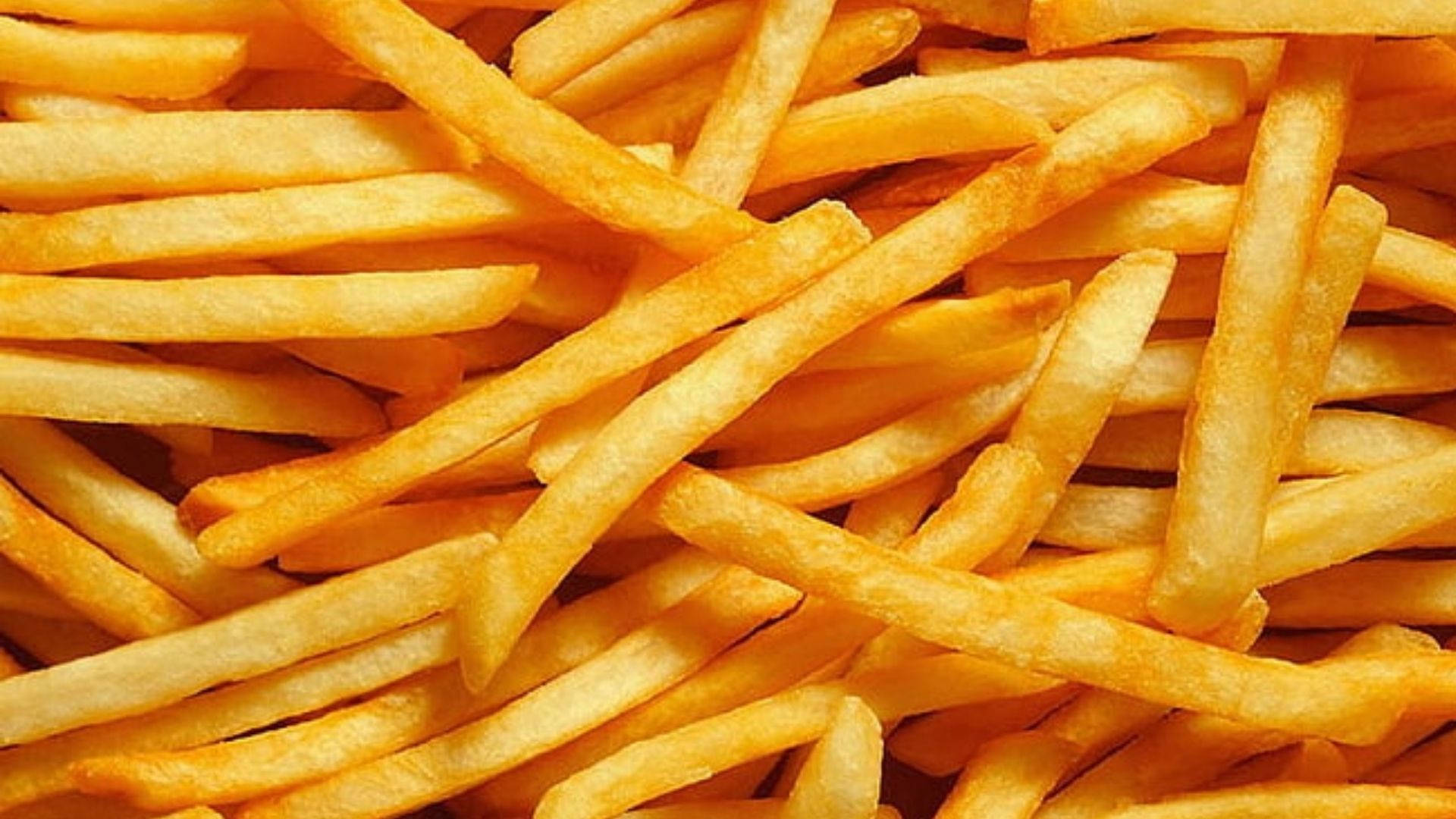 Crispy Golden French Fries Wallpaper