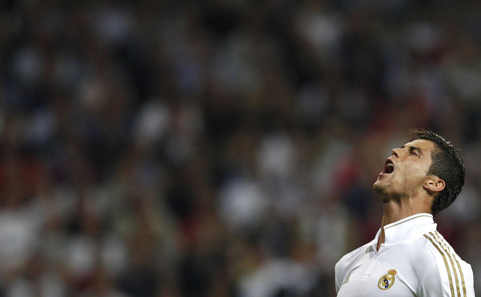 Cristiano Ronaldo Celebrates with a Victory Scream Wallpaper