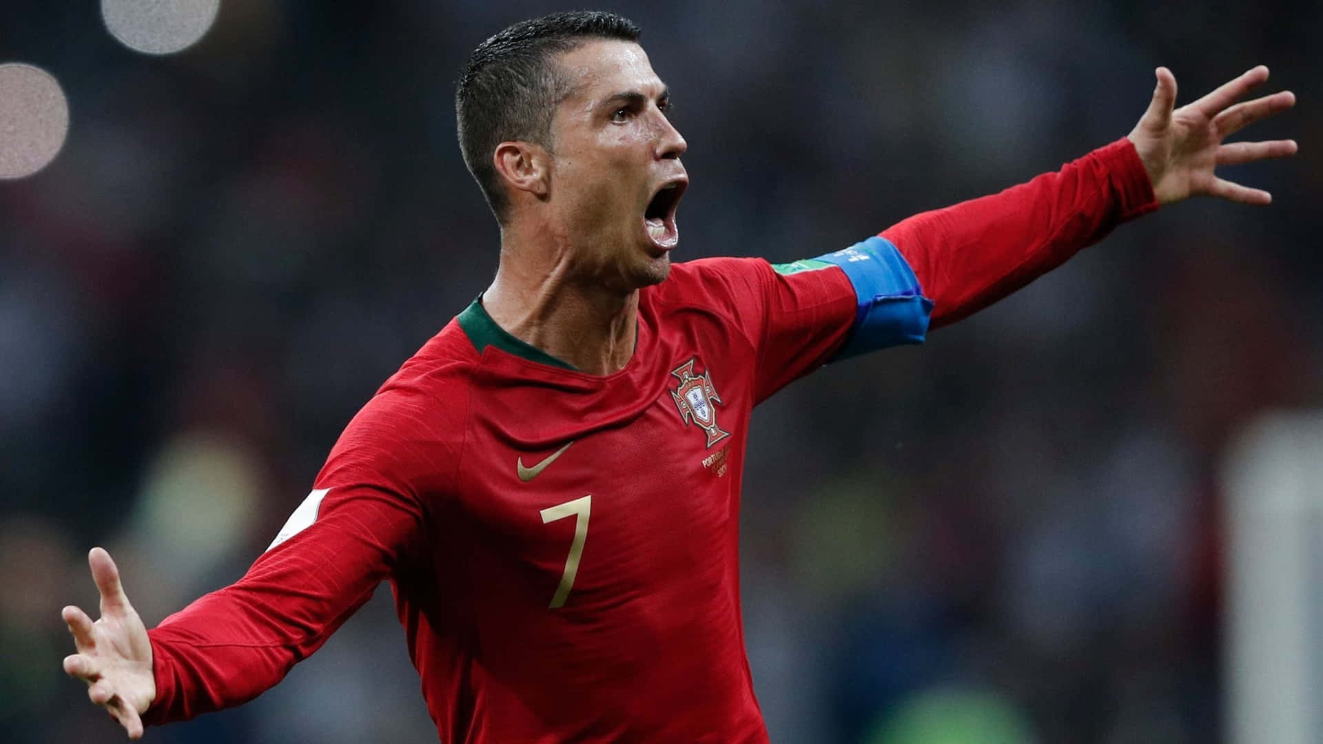 Cristiano Ronaldo dribbles past defenders on the soccer field Wallpaper