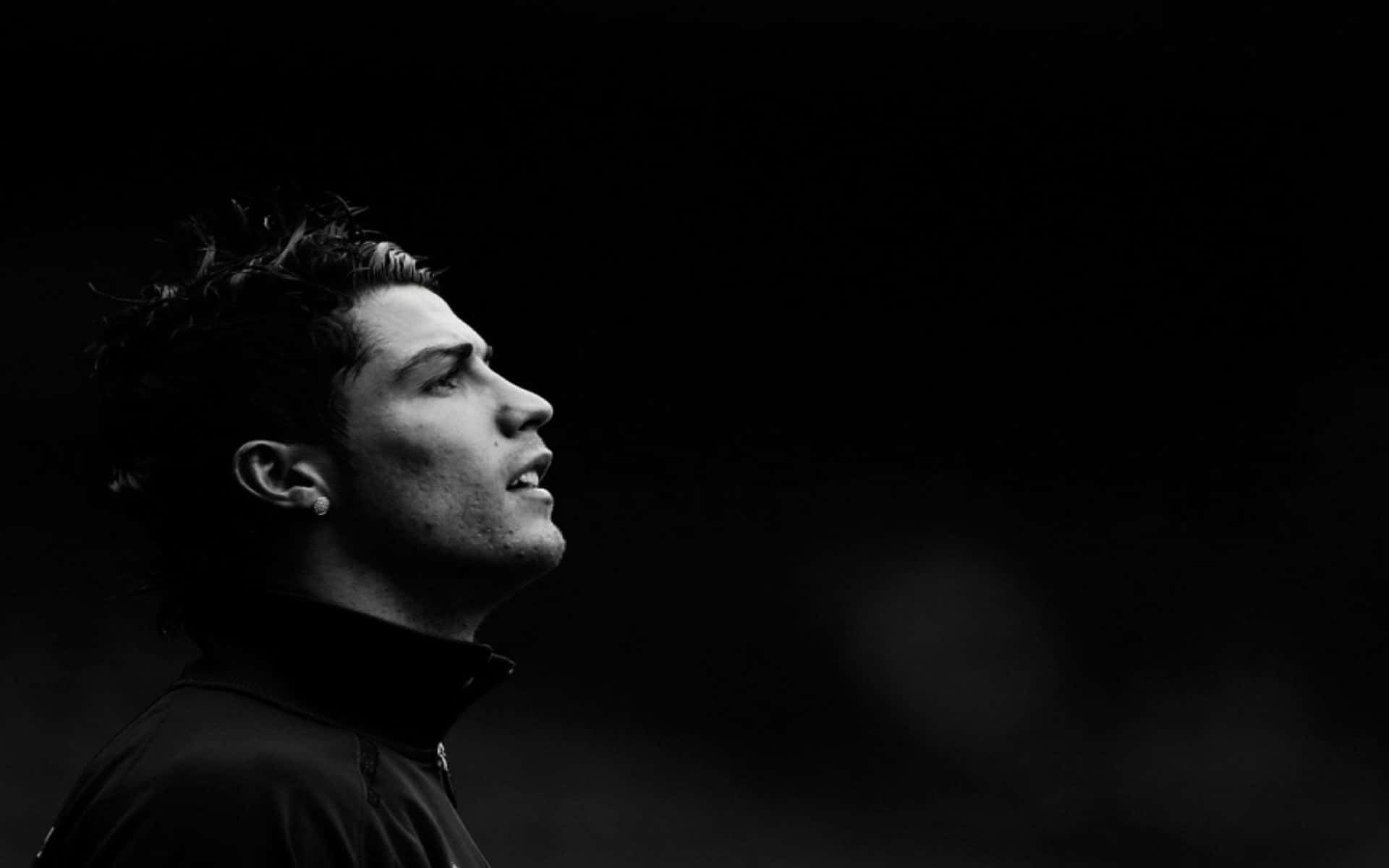 Cristiano Ronaldo spiller fodbold i handling. Wallpaper
