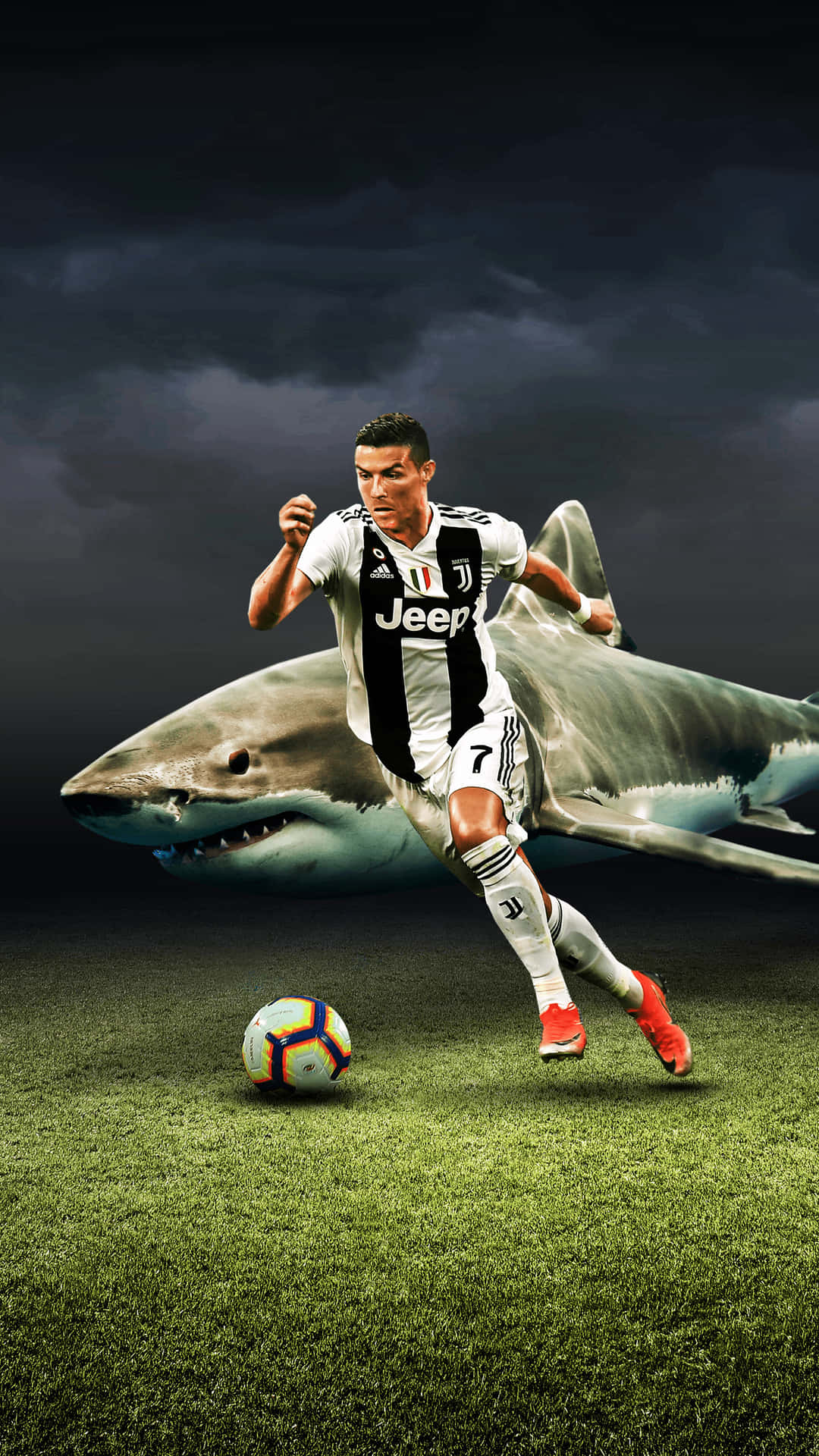 Billede af Cristiano Ronaldo, der er ved at tage et skud i et fodboldspil. Wallpaper