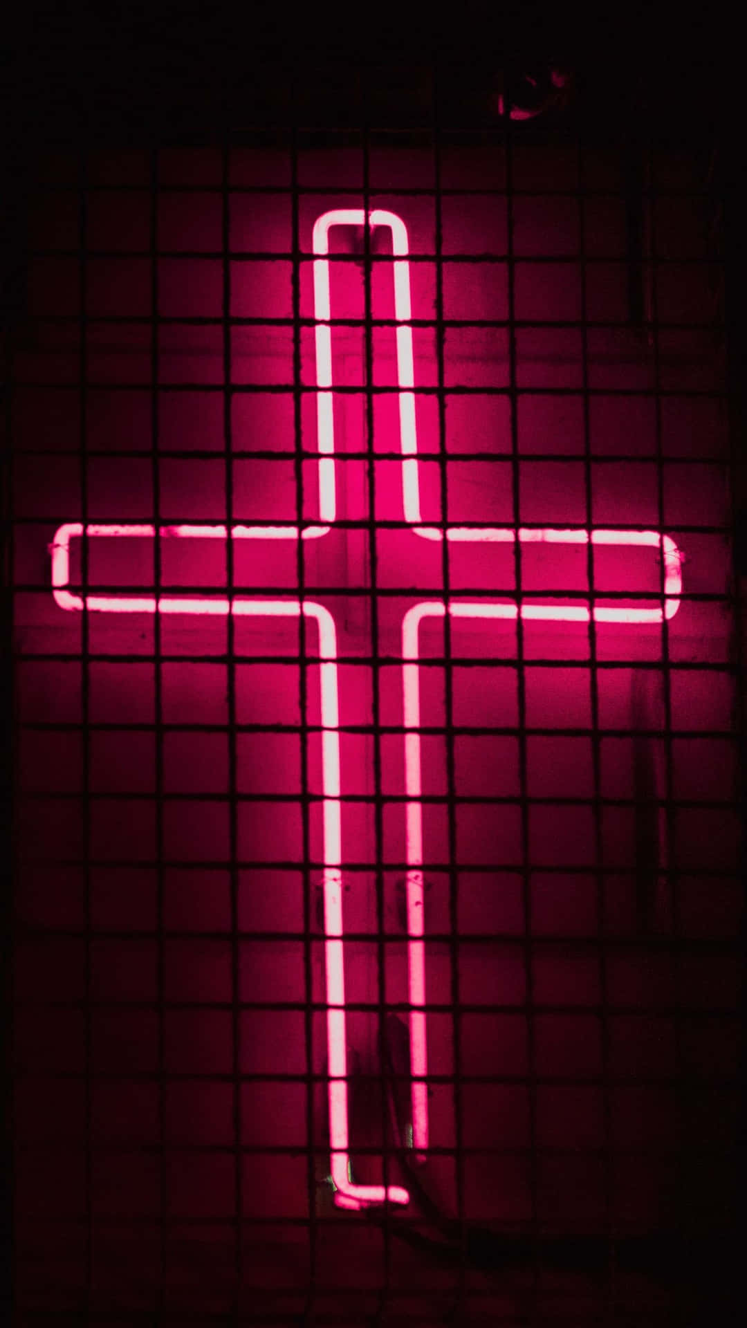 Leuchtendesneon Pinkes Kreuz Für Das Iphone. Wallpaper