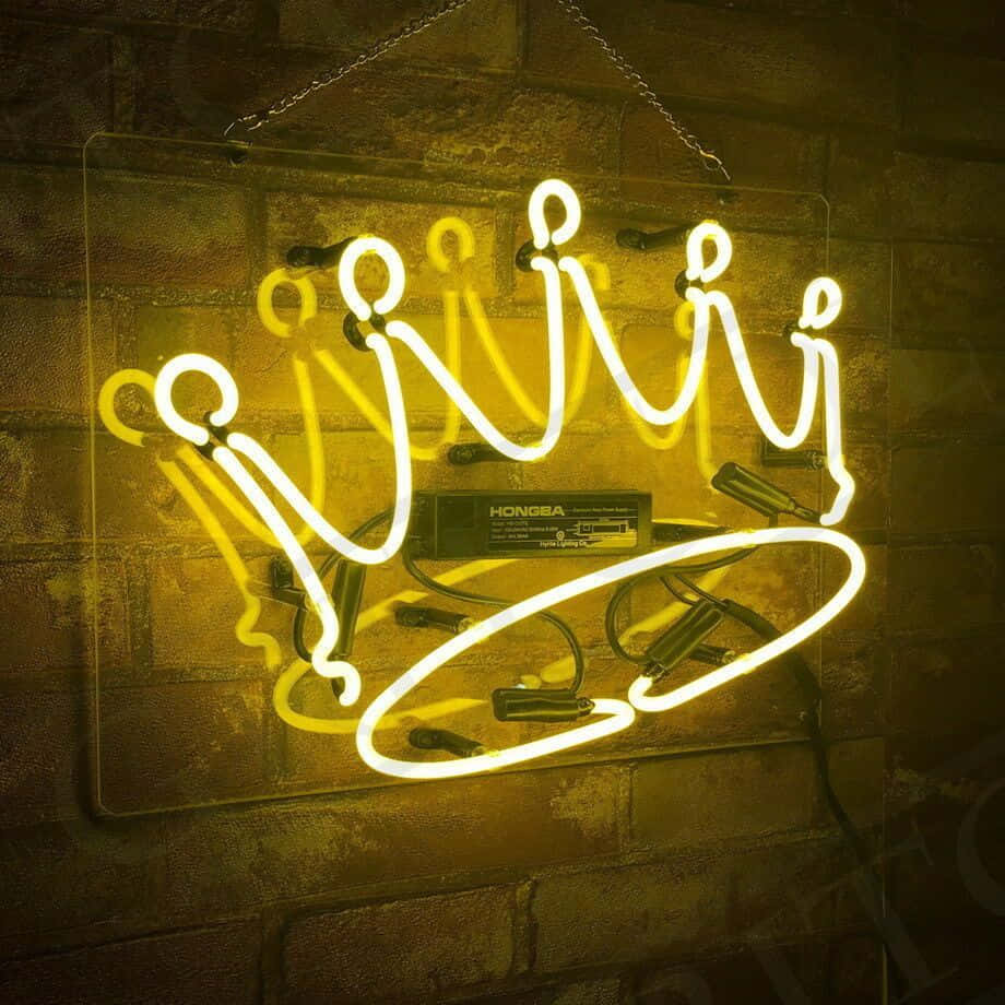 Download A Neon Sign With A Crown On It | Wallpapers.com