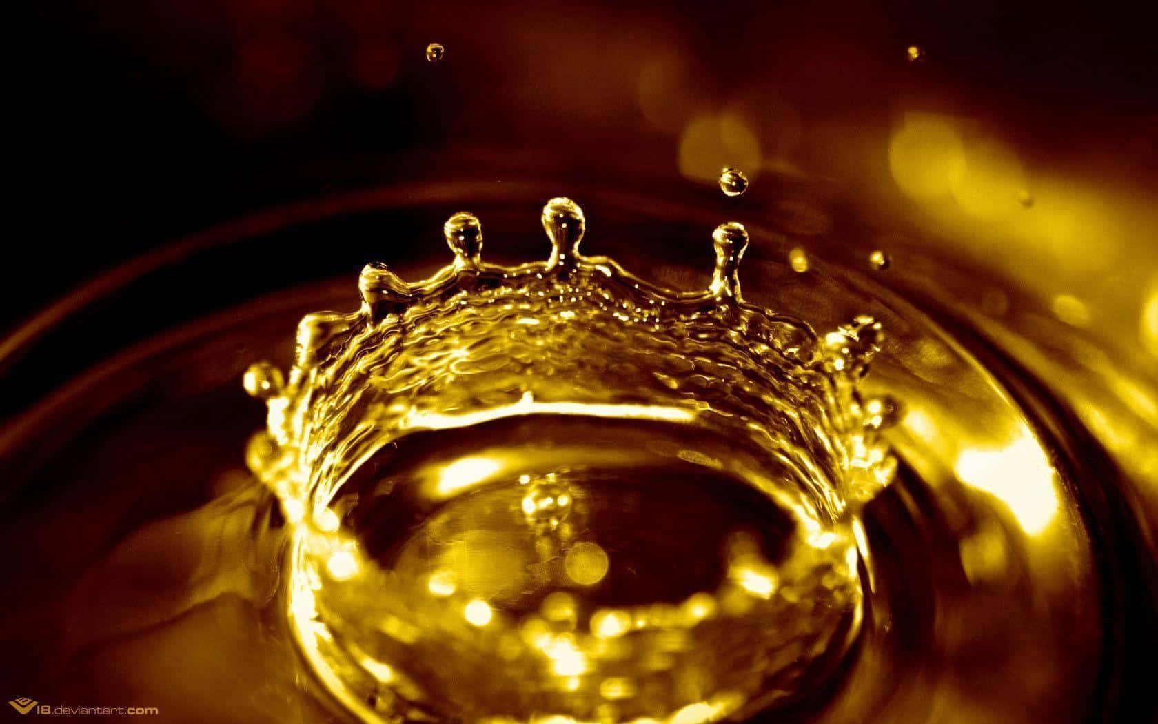A Close Up Of A Gold Crown In A Glass