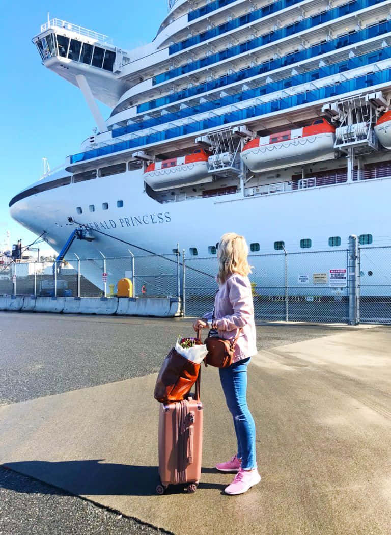 Woman Next To Cruise Ship Picture