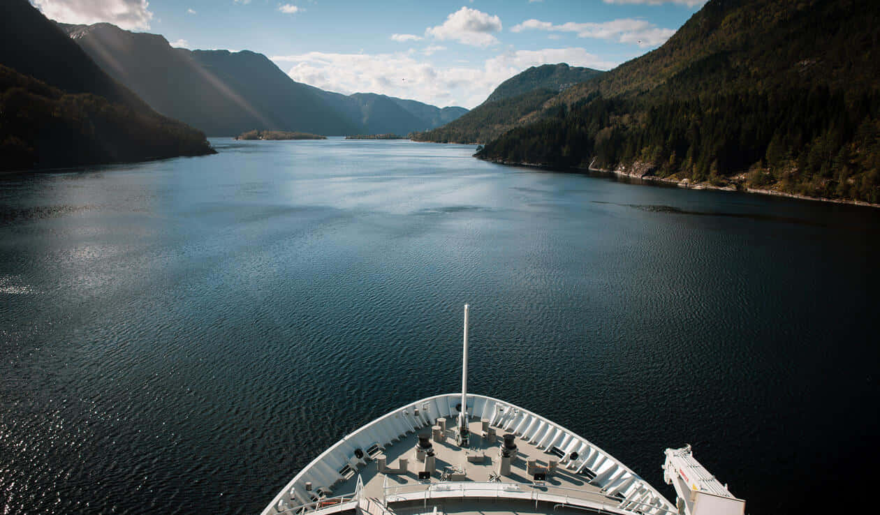 Cruise Ship Entering Majestic Fjord Wallpaper