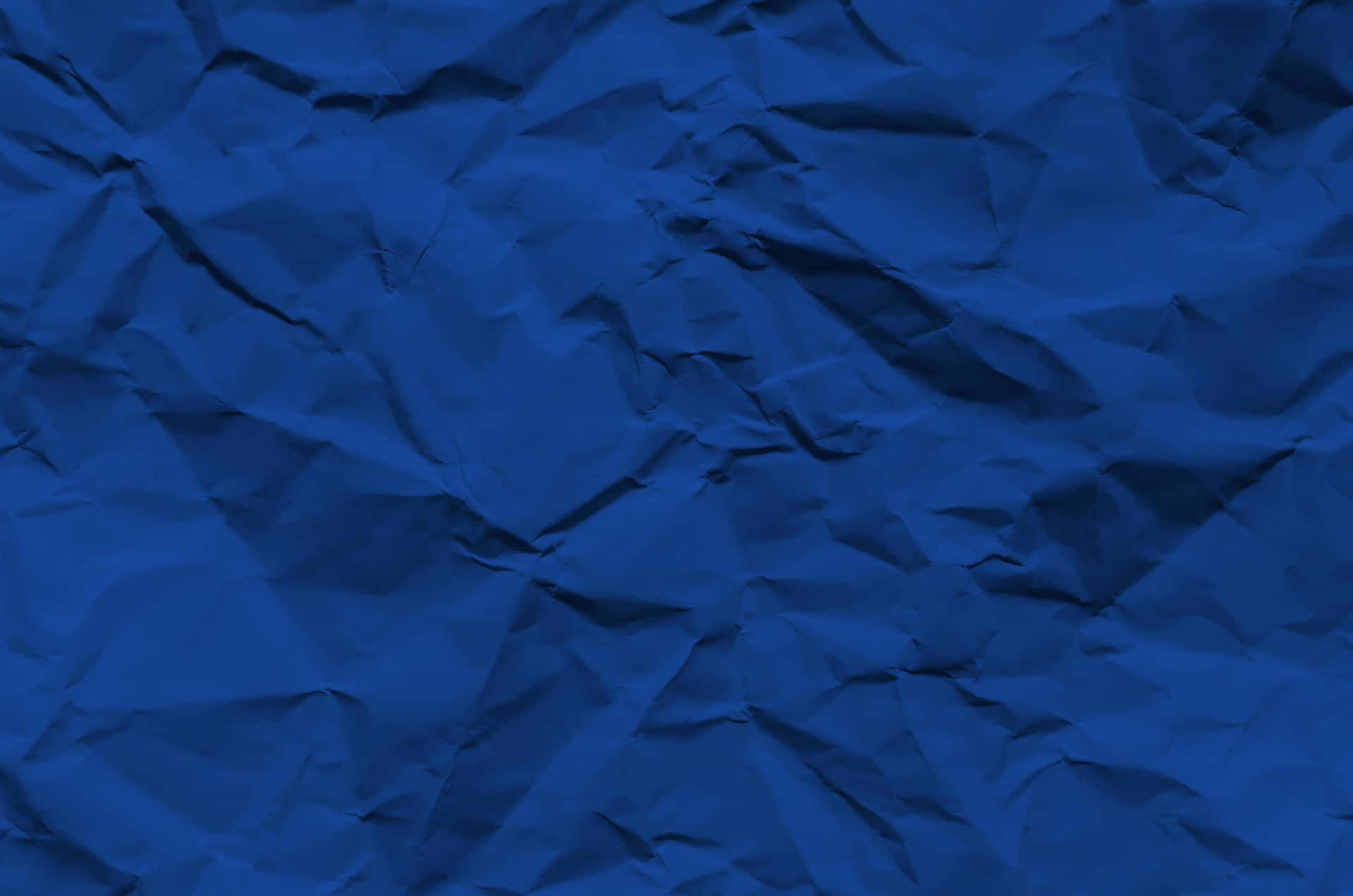Blue Paper Background With Crumpled Paper