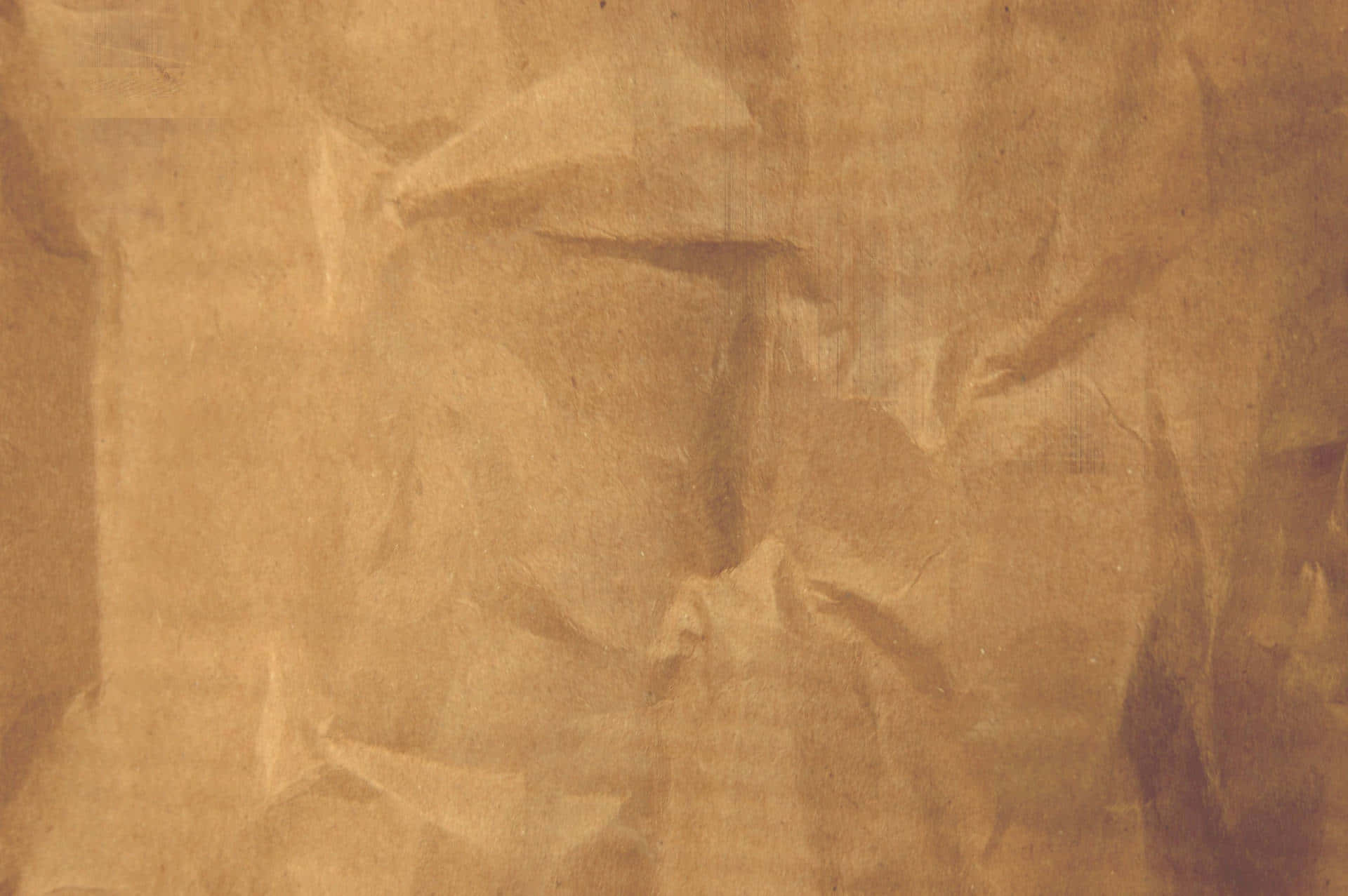 A Brown Paper Texture With A Brown Background