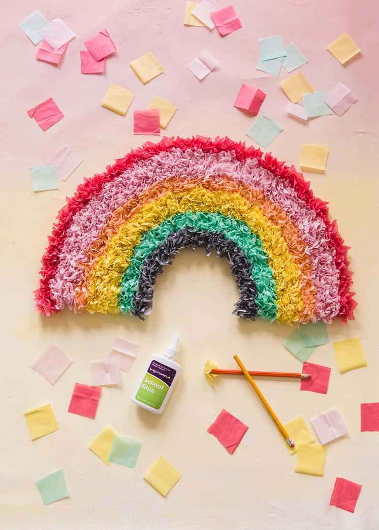 A Rainbow Made Of Colorful Paper And A Glue Stick