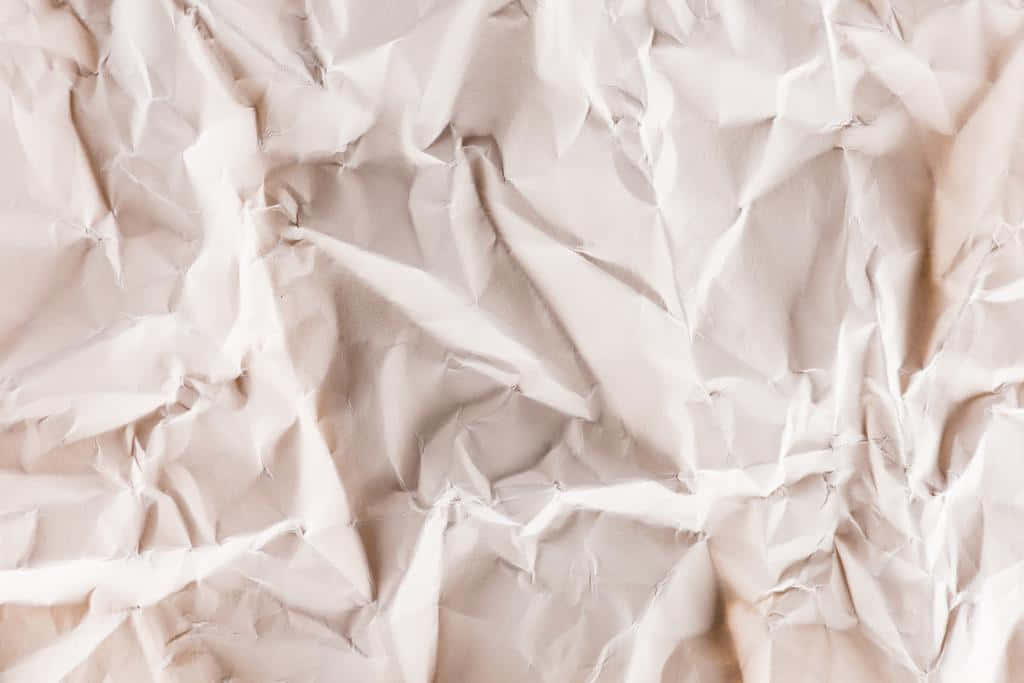 A Close Up Of A Crumpled Piece Of Paper