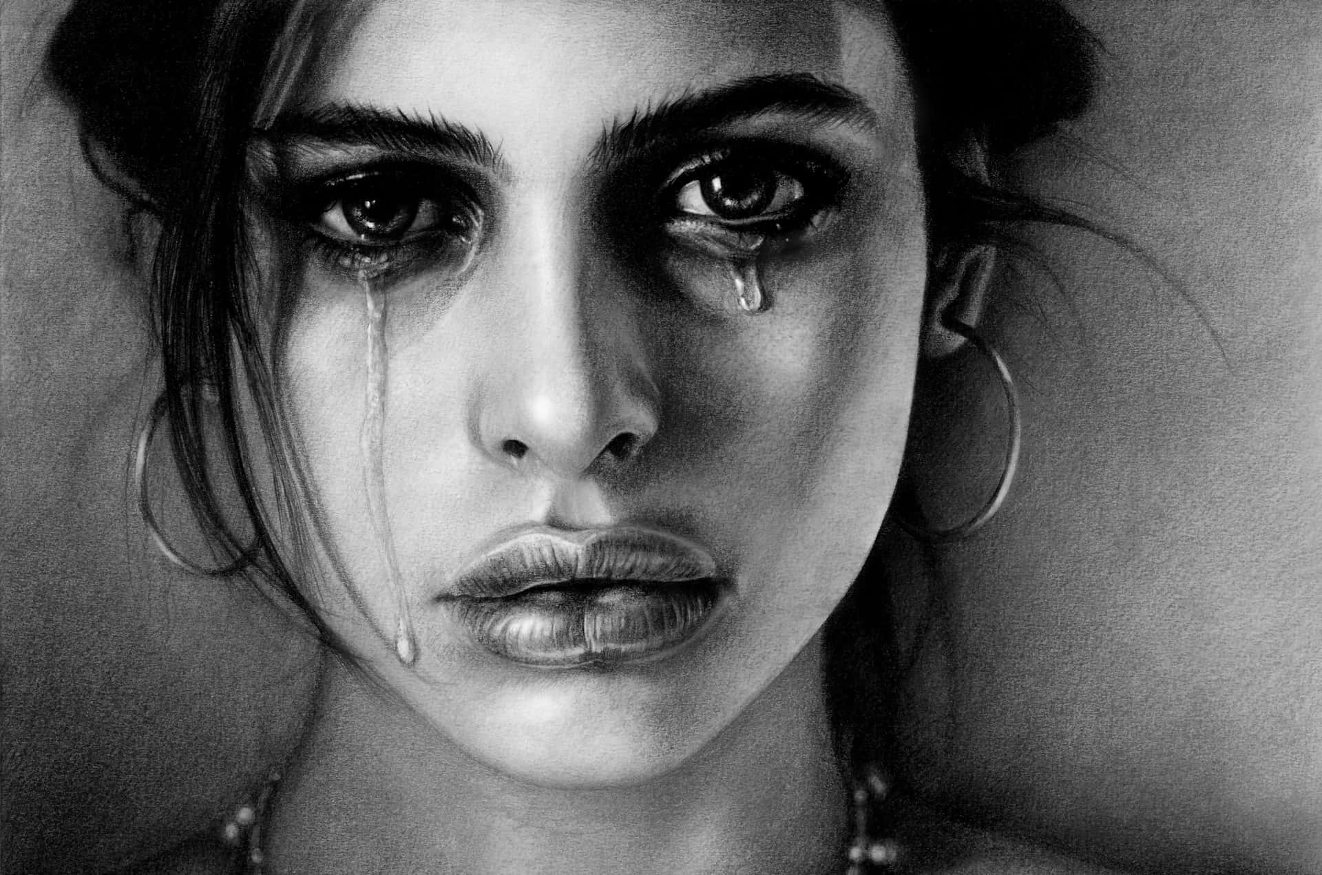 Undibujo De Una Mujer Con Lágrimas En Su Rostro