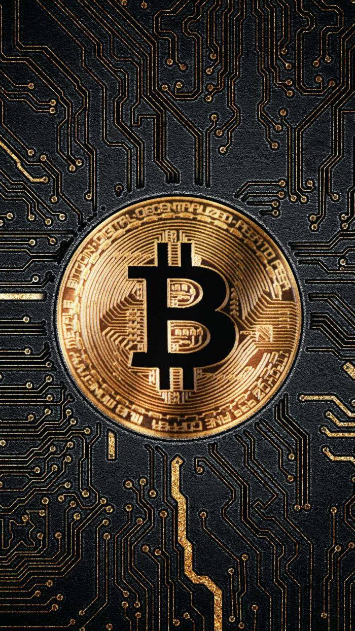 Crypto Bitcoin On Black Gold Motherboard Background