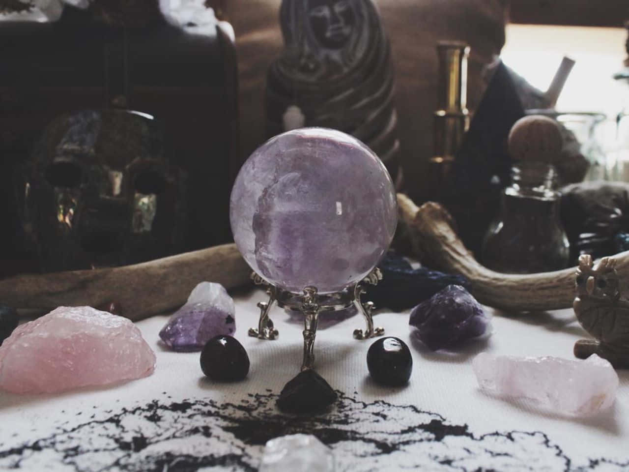 Magical Crystal Ball on a Table Wallpaper