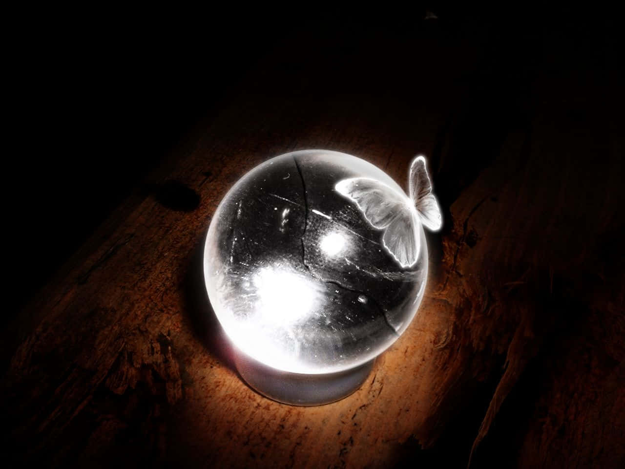 Crystal Ball on Wooden Surface Wallpaper