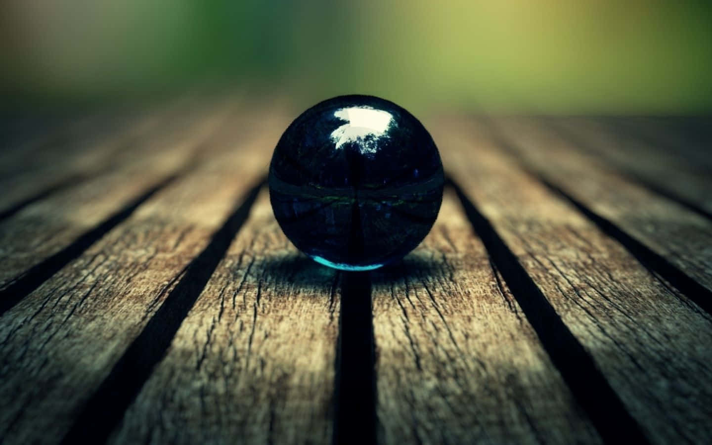 Mystical Crystal Ball on a Table Wallpaper