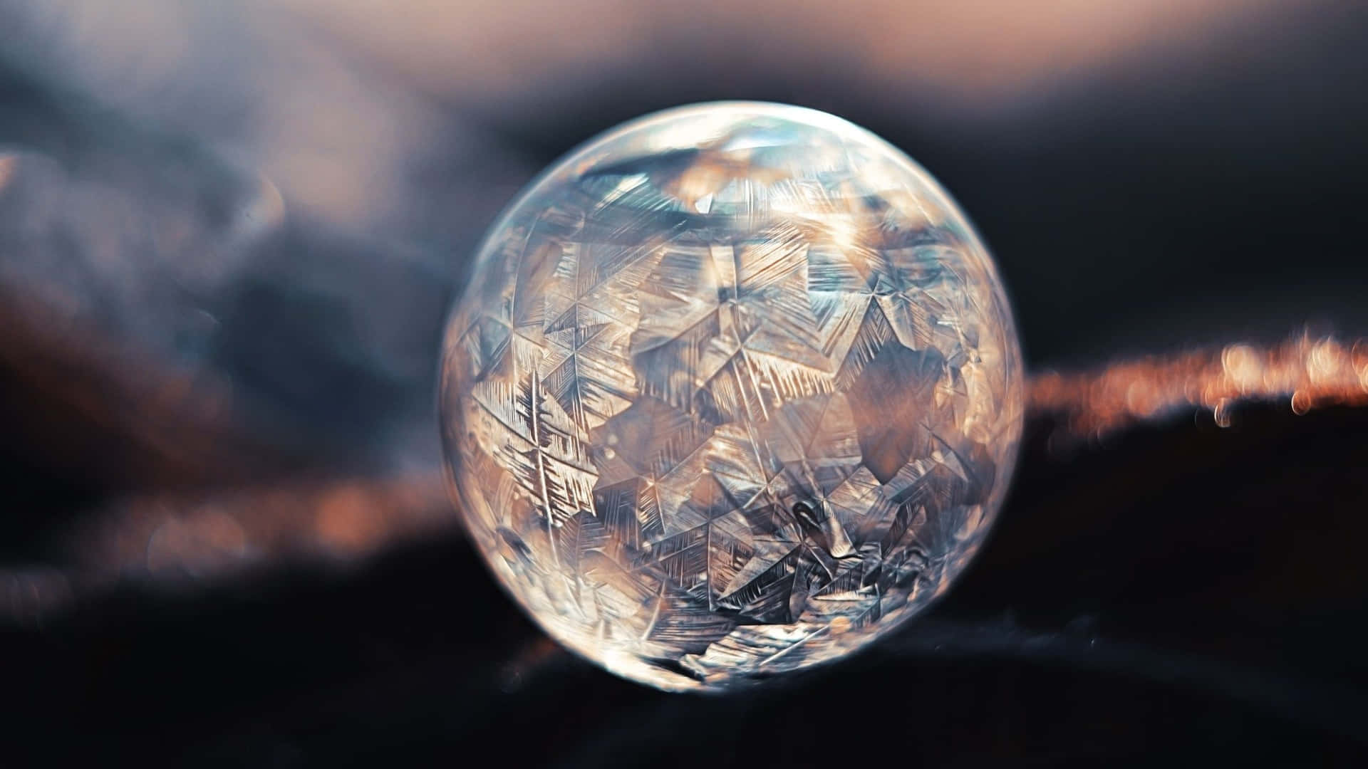 Mysterious Crystal Ball on a Dark Background Wallpaper