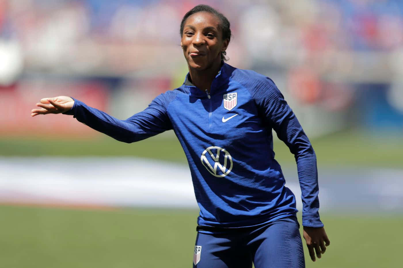 Crystal Dunn In Action On The Soccer Field Wallpaper