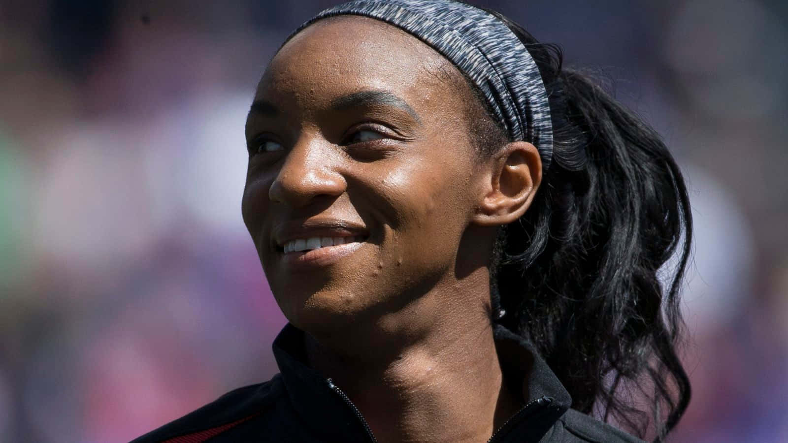 Crystal Dunn On The Field Displaying Top Tier Skills Wallpaper