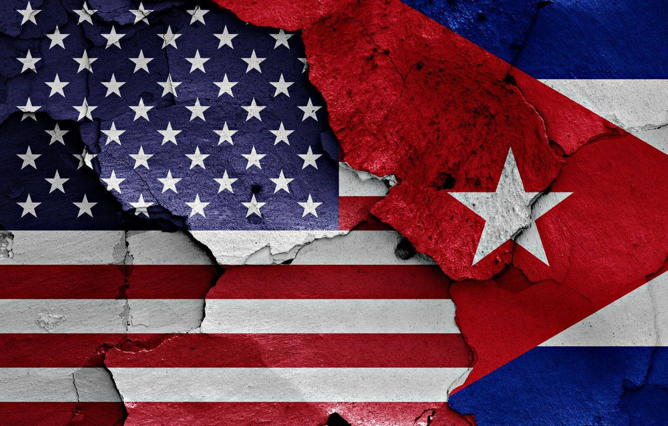 Cuban Flag And Usa Flag Torn