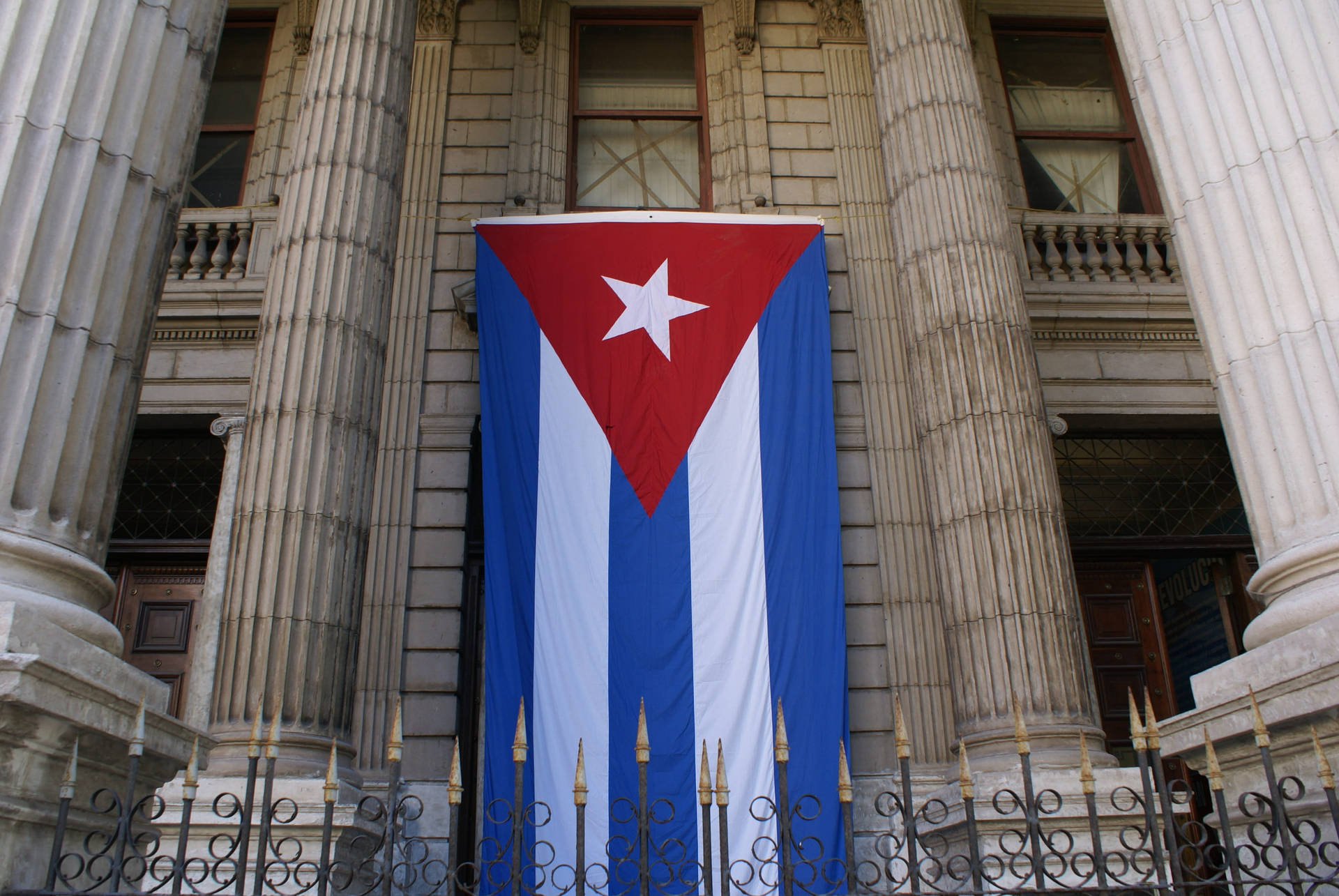 Cuban Flag Outside Mansion