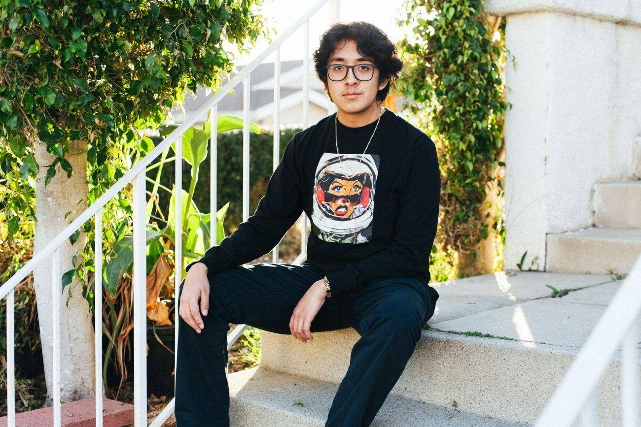 Cuco Sitting On The Stairs Wallpaper