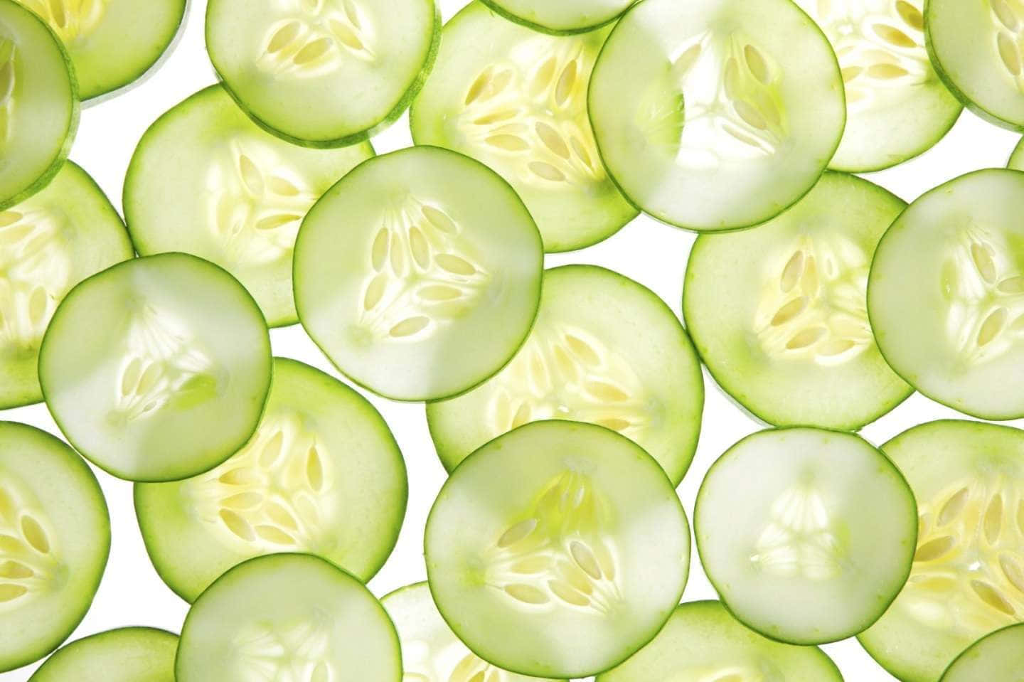 Cucumber Slices On A White Background
