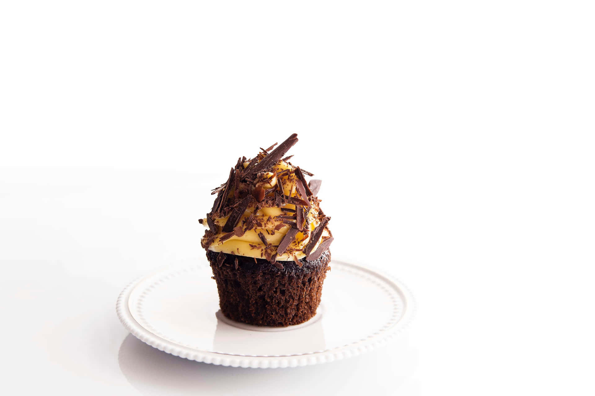A delicious, sweet cupcake with an ice cream topping, perfect for any occasion