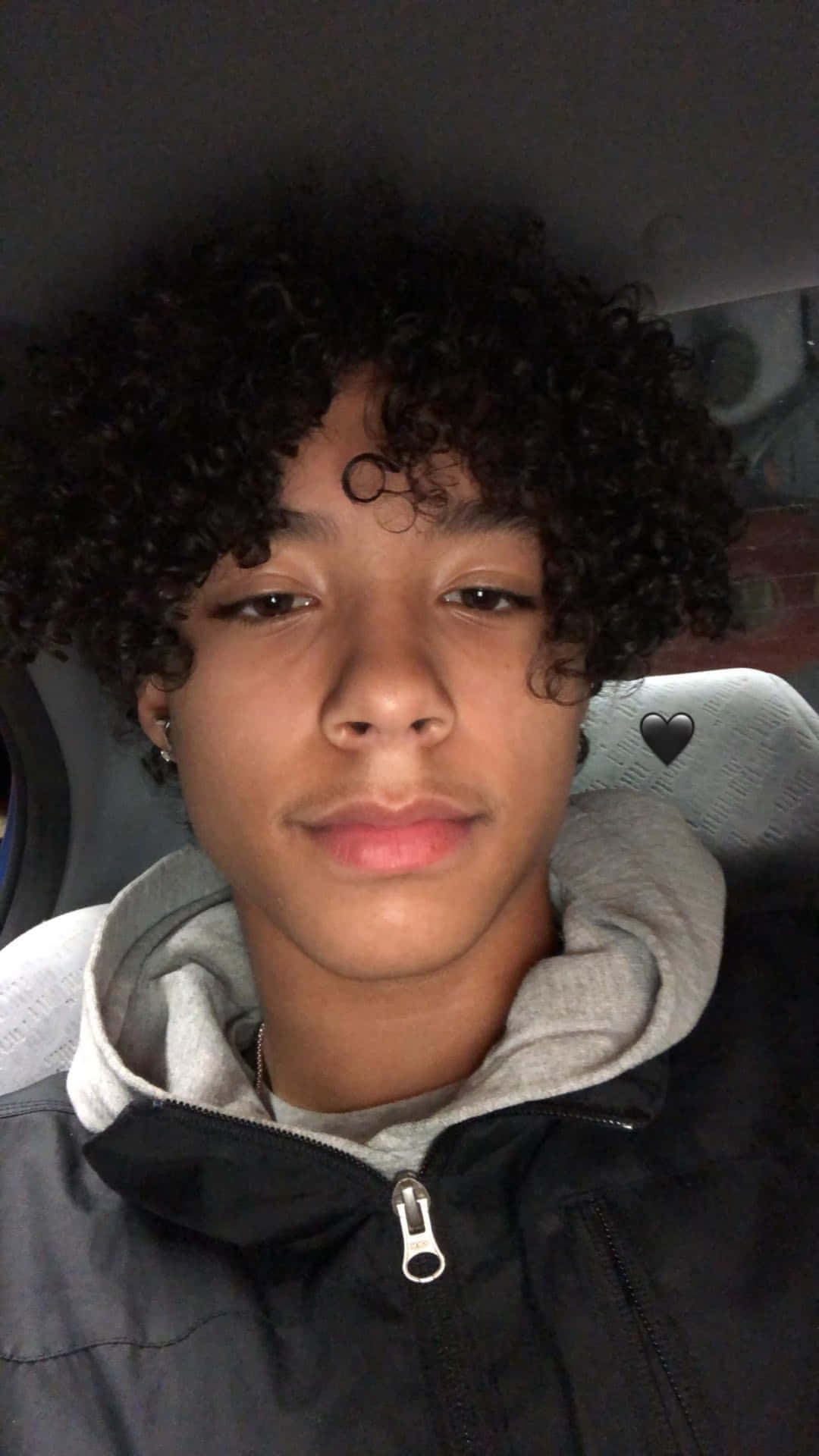 Curly Haired Teen Boy Car Selfie.jpg Wallpaper