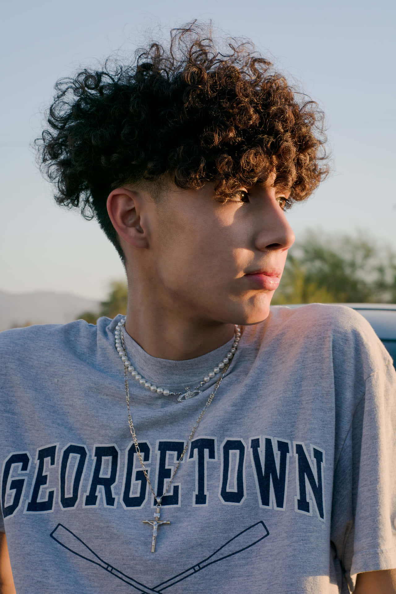 Curly Haired Youthin Georgetown Tee Wallpaper
