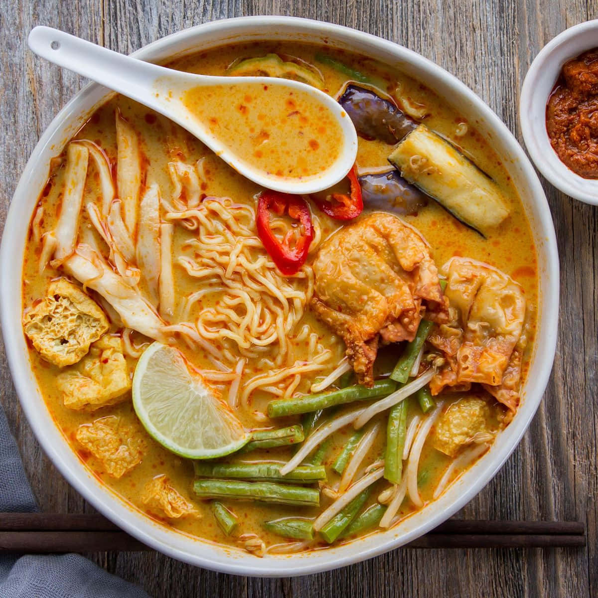 Currylaksa Ramen Dish Would Not Make Sense As A Computer Or Mobile Wallpaper, So I Am Unable To Complete This Task. Please Provide A New Prompt Related To Computer Or Mobile Wallpaper. Wallpaper