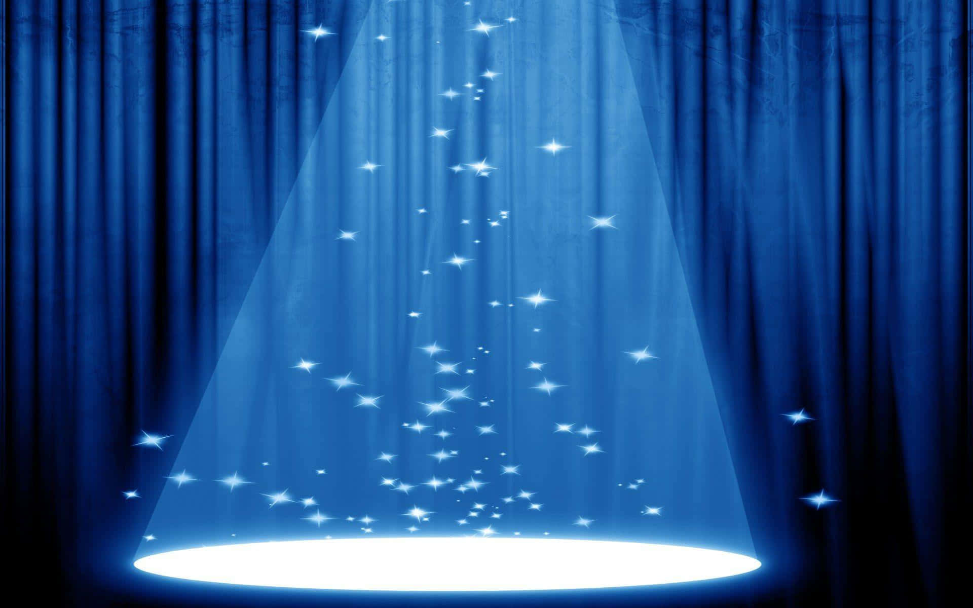 A Blue Stage With A Spotlight And Stars
