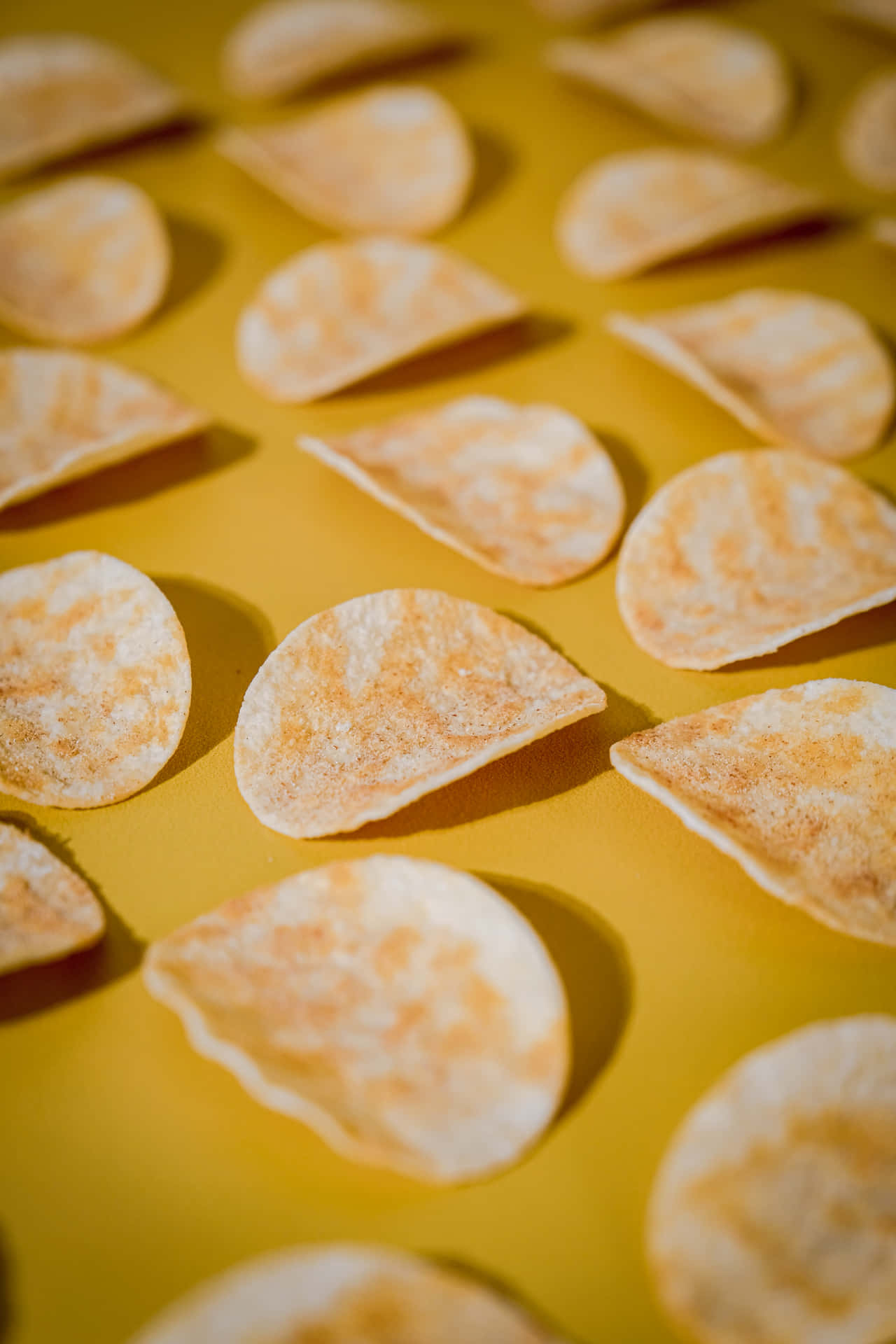 Curved Yellow Potato Chips Wallpaper