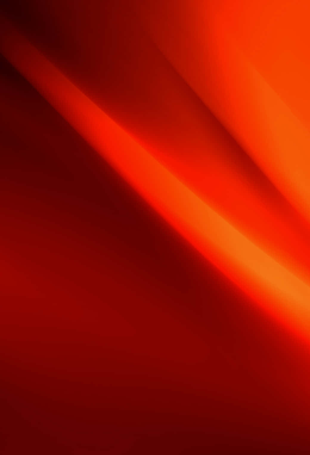 An Orange Background With A Light Red Color Wallpaper