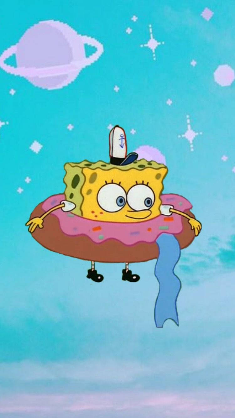 Cute Aesthetic Cartoon Spongebob With Doughnut Wallpaper