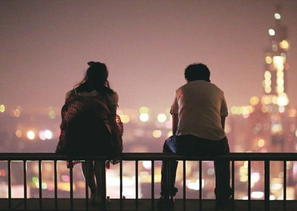 Cute Aesthetic Couple Sitting On City Picture