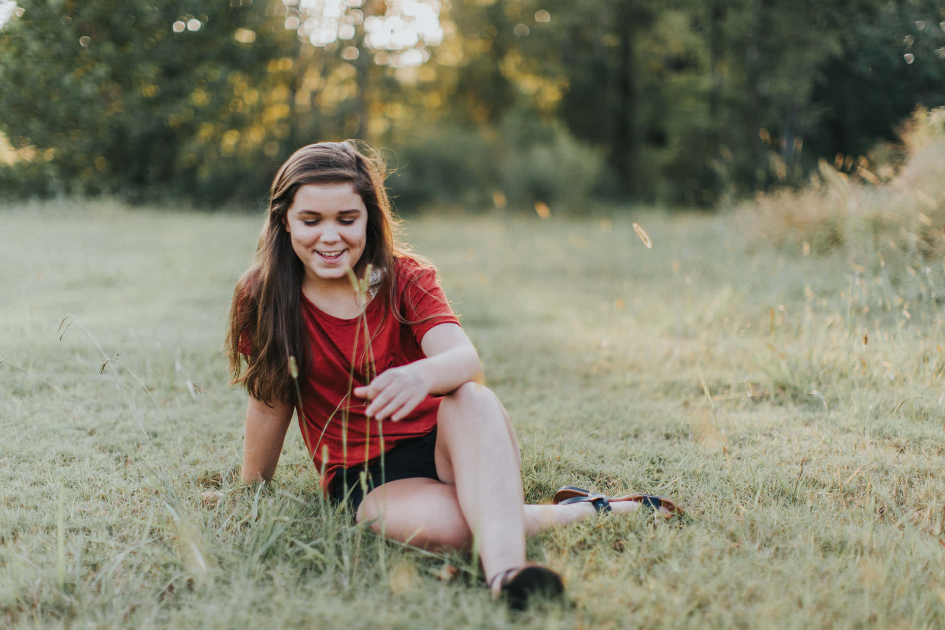 Cute Aesthetic Teenage Girl Sitting Grass Wallpaper