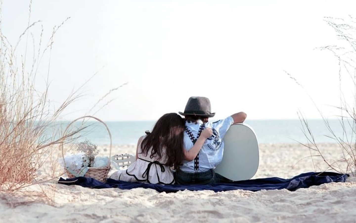 Cute Baby Couple Beach Date With Guitar Wallpaper