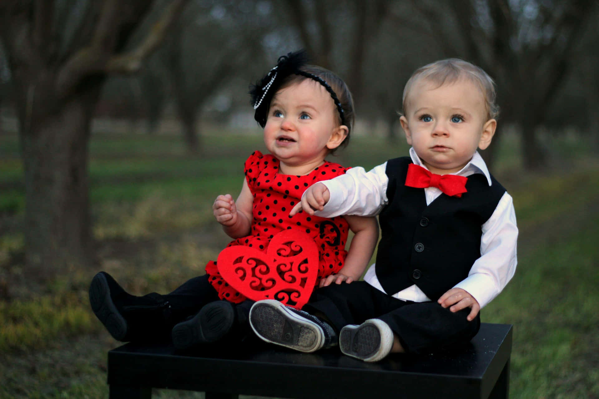 Cute Baby Couple Formal Black&Red Attire Wallpaper