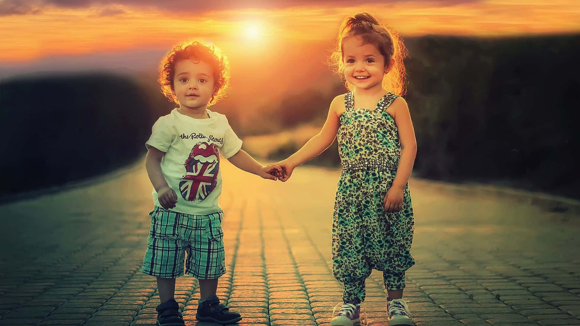 Download Cute Baby Couple Holding Hands Sunset Wallpaper 