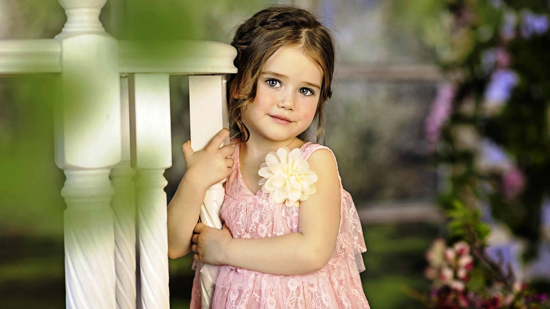 Cute Baby Girl In A Pink Dress Wallpaper